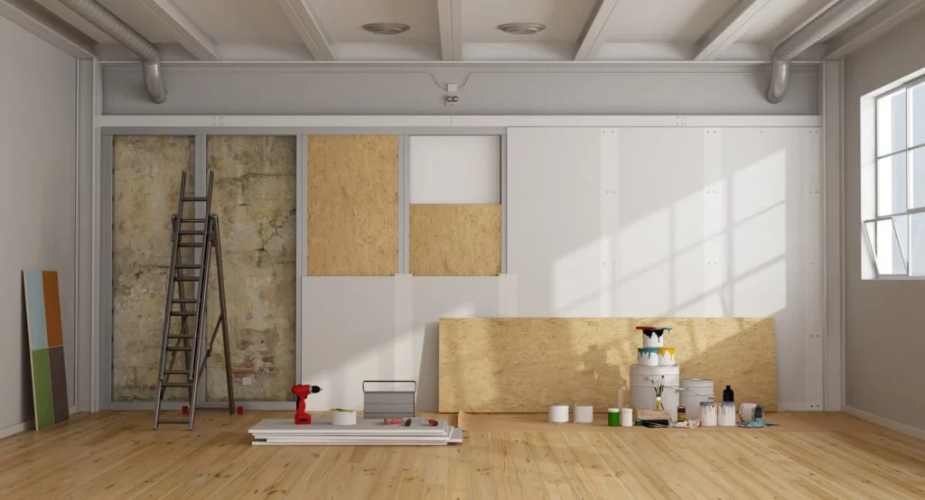 Mur en rénovation, peint par un architecte à Caen, pour créer une finition moderne et soignée