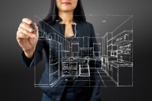 La décoratrice d'intérieur petit budget se charge de la conception du plan de la cuisine pour la rendre design et fonctionnelle.