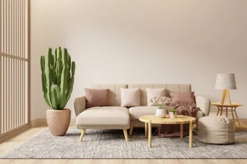 Salon lumineux près d'une grande fenêtre, aménagé avec soin par un architecte à Issy-les-Moulineaux