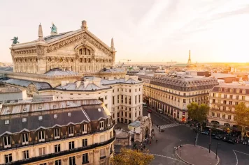 high-angle-view-of-paris-skyline-at-sunset-royalty-free-image-1575587641