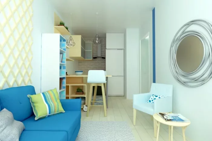 Petit appartement coloré et bien agencé par un architecte intérieur à Grenoble, avec mobilier compact et ambiance contemporaine